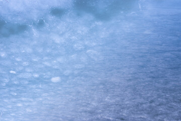 Natural texture of ice, frozen lake  as  background.