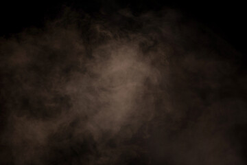 White steam on a black background.