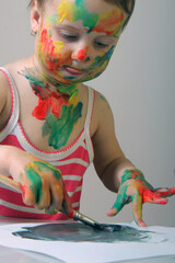 A young talented artist making her first steps in the world of creativity.