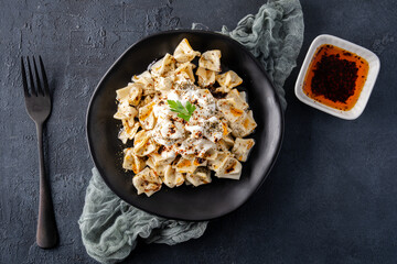 Traditional Turkish dish manti. Traditional dish made with handmade dough and minced meat.
