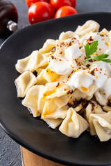 Traditional Turkish dish manti. Traditional dish made with handmade dough and minced meat.