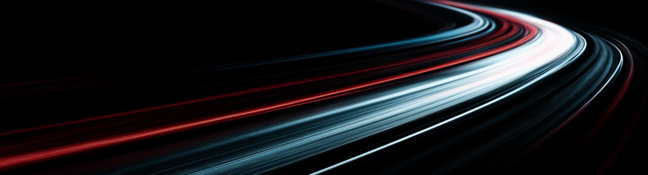 Lines that create a swirling light effect. Abstract lines of movement on a dark background for modern, futuristic design themes.