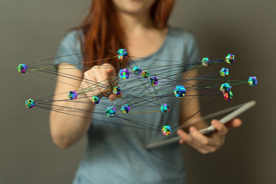 A woman explores a digital network with a tablet. Modern technology and digital connections illustrated. Perfec