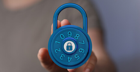 Hand holding a blue padlock. Concept of security and data protection. Combination lock with the...