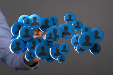 Hand holding social media icons, symbolizing connection and global communication. Representing...