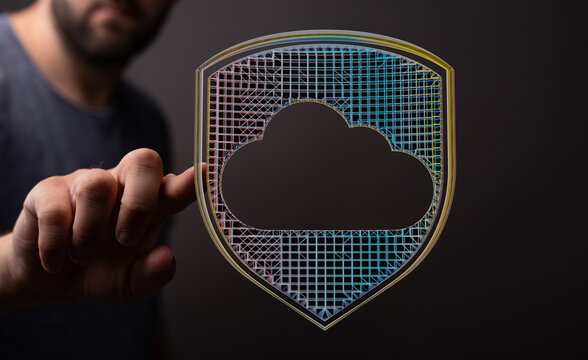 Hand touching an abstract cloud icon, representing data security and secure cloud computing solutions. Concept of network protection