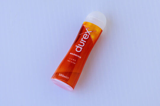 Close-up of a bottle of Durex Play Warming Lube (100ml) isolated on white background. Durex is a popular sexual lubricant brand globally.