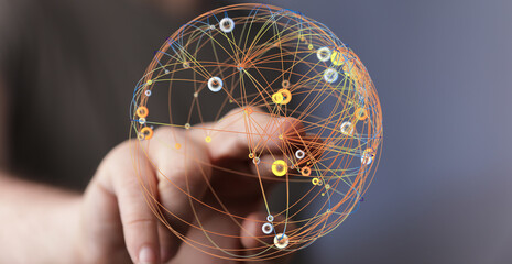 Hand reaching towards a glowing sphere representing global network and technology connections....