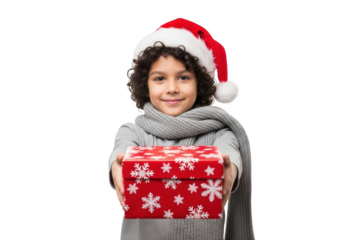 Young boy in santa hat holding a christmas gift, isolated on transparent background
