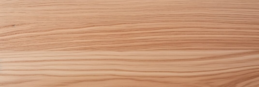 A close-up view of smooth, light-colored wood showcasing its natural grain patterns, ideal for design and woodworking projects.