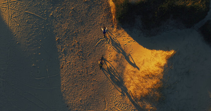 Aerial, people and cycling on bicycle outdoor for fitness, extreme sport and adventure challenge. Cyclist, nature and bike for off road exercise, endurance training and race for triathlon competition - Powered by Adobe