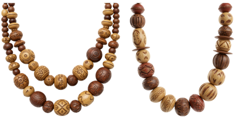 Close up of two strands of carved wooden beads on a black background