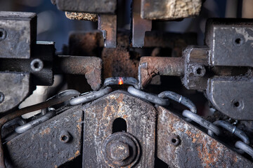 Hot Metal Chain Link Welding in Industrial Machine
