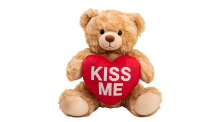 Adorable fluffy light brown teddy bear holding a red heart with the words kiss me written in white letters isolated on transparent background