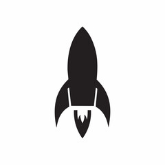 Black silhouette of a rocket ship taking off