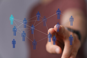 Visualize connection, communication, and networking with this abstract image depicting human-like figures linked together. Explore collaboration