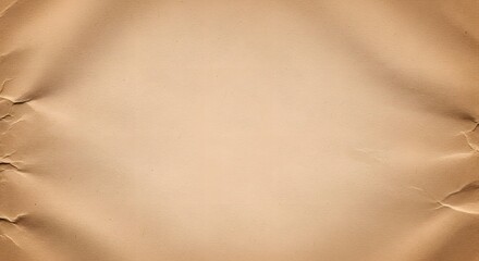 Close-up of crumpled brown paper texture with soft lighting and natural folds