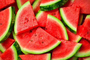 Triangles of sliced watermelon close-up. Watermelon pattern, macro photo. Close-up.