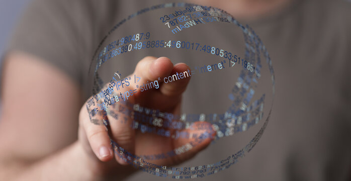 Close-up of hand interacting with a digital globe displaying abstract code. Conceptual image of technology, data, and the internet. D - Powered by Adobe