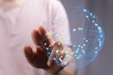 Hand touching a futuristic digital sphere representing worldwide connection and communication, technology concept for business and innovation. R