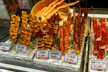Assorted Grilled Seafood Skewers on Market Display