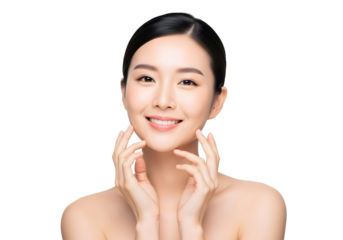 Portrait of a beautiful young Asian woman with radiant healthy skin gently touching her face reflecting natural beauty and self-care for skincare and wellness