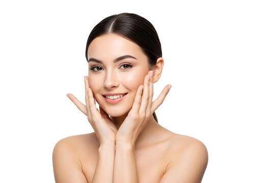 Beautiful healthy young woman with clear glowing skin happily touching her face, symbolizing effective skincare, natural beauty, and youthful radiance