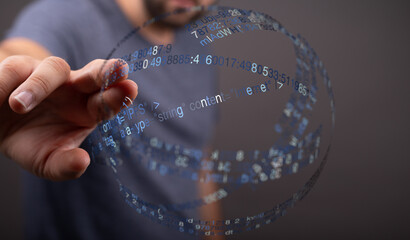 Abstract image showing a hand interacting with a sphere containing digital data, representing technology and innovation.