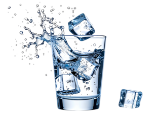 Refreshing beverage with ice splashing into glass