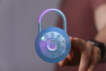 Close-up of a blue combination padlock, symbolising security, data protection, and access control.  Ideal for concepts related to cyb
