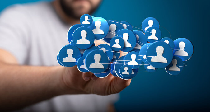 Close-up of a hand holding a network of connected user icons, illustrating concepts like connection, community and teamwork. Perfect for busines - Powered by Adobe