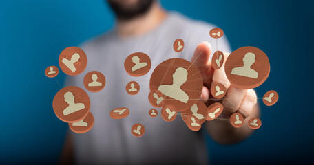 Digital network connecting people. A man touches a network of connected avatars. Concept for business and social connections.