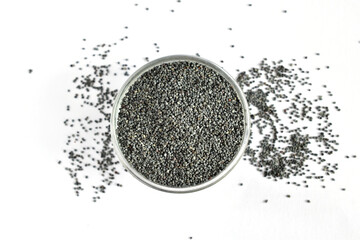 Poppy seeds. They are used whole or ground as a food ingredient, as well as to produce poppy seed oil.