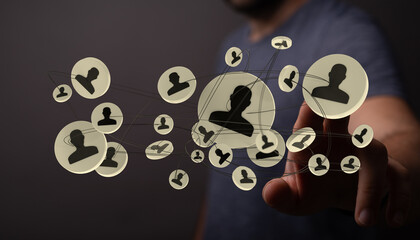 A hand touches a network of user icons, symbolizing digital connection and online social...