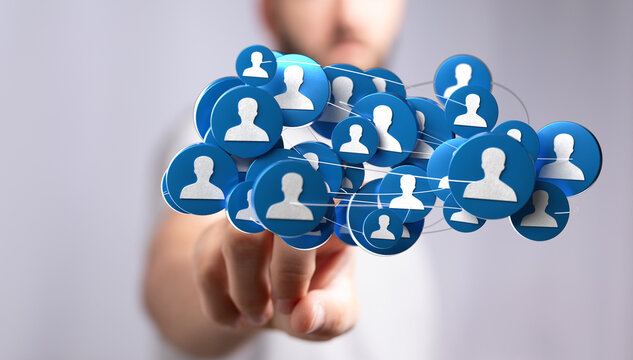 Hand pointing at user icons forming a network. Illustrating digital connections, social media, business, networking, teamwork, and global commun