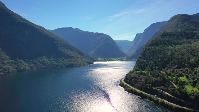 Breathtaking views of serene waters and majestic mountains in stunning fjord landscape