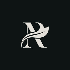 Elegant letter R logo with leaf accent vector design