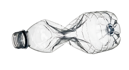 Crushed plastic bottle on black background representing waste and recycling efforts showcasing environmental awareness and the need for sustainable solutions