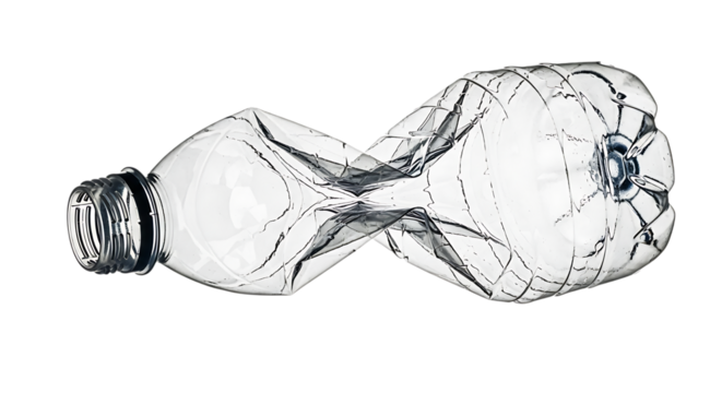 Crushed plastic bottle on black background representing waste and recycling efforts showcasing environmental awareness and the need for sustainable solutions