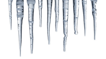 A close up abstract view of multiple sharp icicles hanging down from an unseen surface against a deep black background isolated on transparent background
