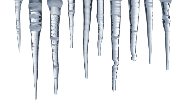 A close up abstract view of multiple sharp icicles hanging down from an unseen surface against a deep black background isolated on transparent background