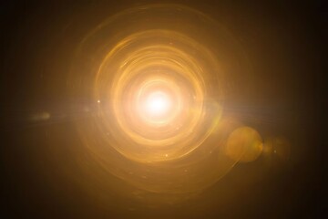 Abstract golden tunnel of light with circular motion and lens flare. Concept of spiritual hope, heaven, or sci-fi energy portal