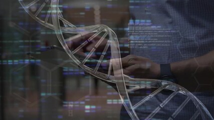 Lab technician tapping tablet in corridor, activating rotating helix over hands and analyzing DNA - Powered by Adobe