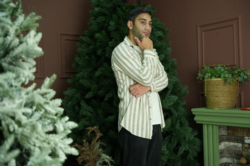 young man standing and thinking