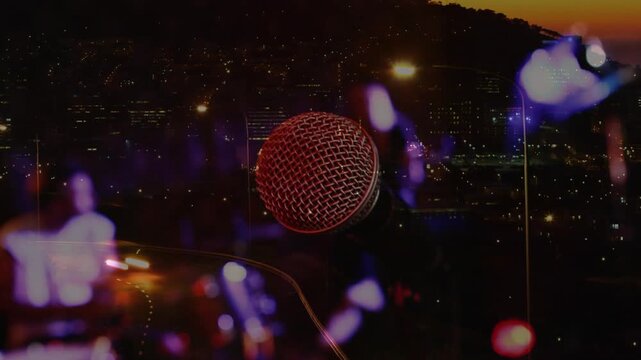 Lead singer moving to mic preparing vocals, drawing focus as concert flares pulsing against skyline