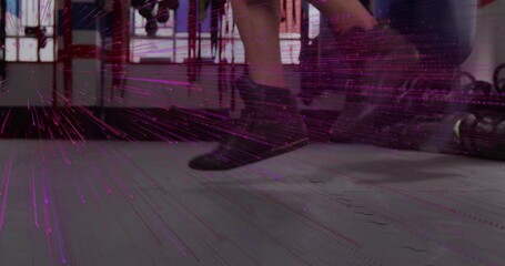 Right foot extending, boxer training footwork in gym, purple streaks crossing feet, bag and ropes