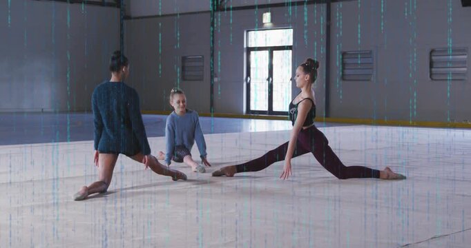 Left woman initiating leg shift while trio practicing wide splits on pale mat for dance training