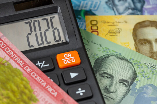 Costa Rica 2026 year. Financial business concept. Money and calculator with date 2026. Market analysis. Costa Rican colones. exchange rate. Economic background. closeup