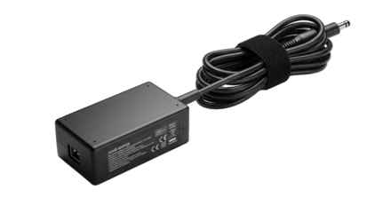 Black power adapter with coiled cable, isolated on transparent background