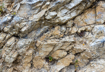 the structure of mountains and stone plateaus of natural origin in a mountainous area, walking on the ground